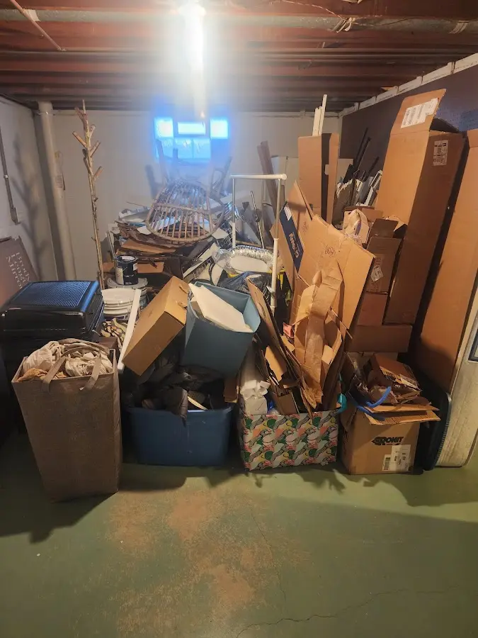 Roll-off dumpster container at job site for 20 Yard Dumpster Rental in Palmetto Estates